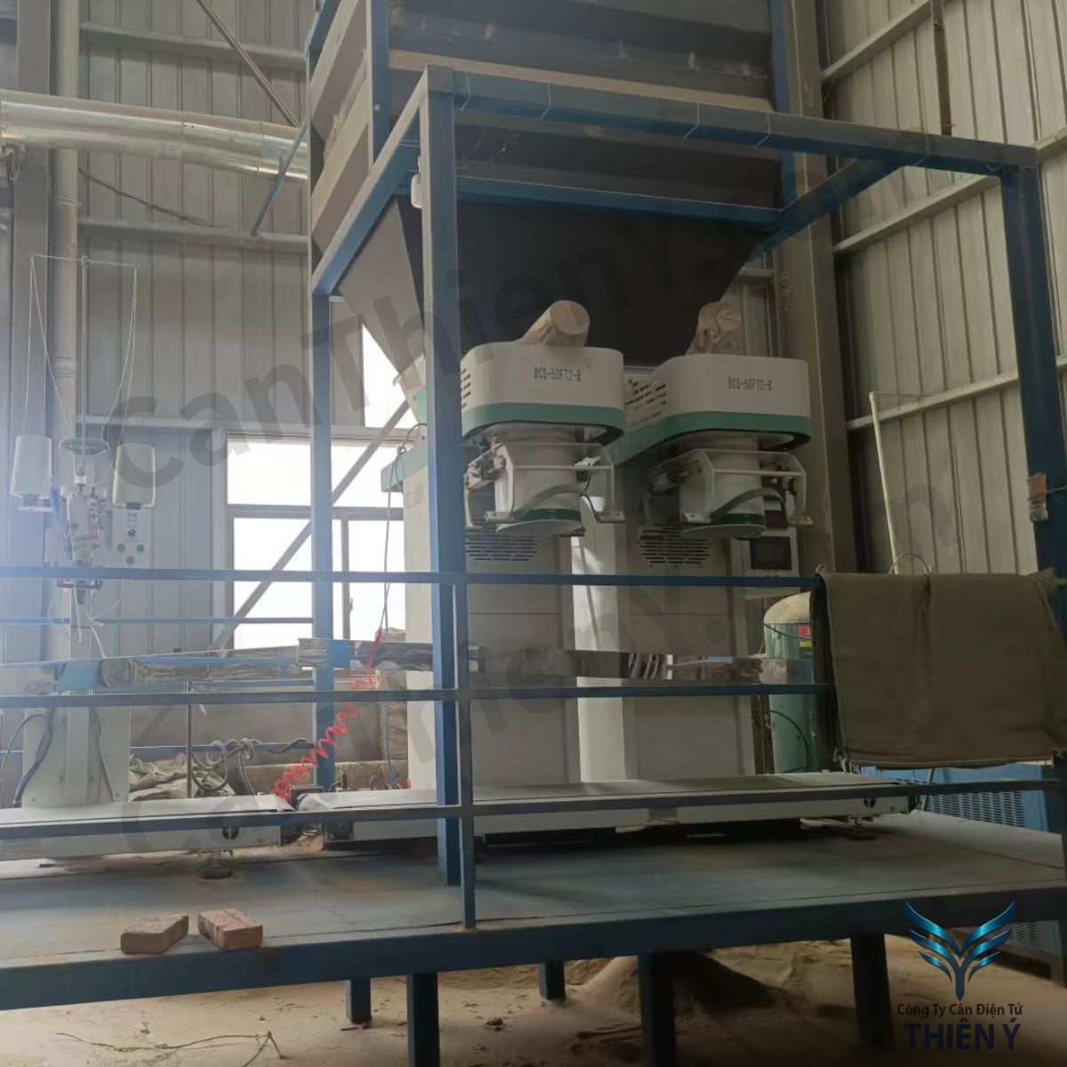 Cân đóng bao ngành xi măng – Chính xác, bền bỉ, bảo hành 18 tháng Thiên Ý